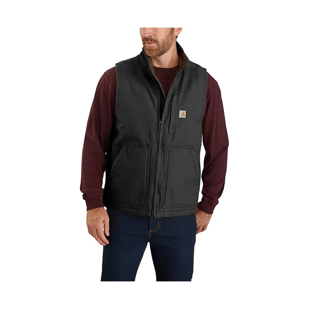 Black zip-front vest with four front pockets and a small Carhartt logo patch