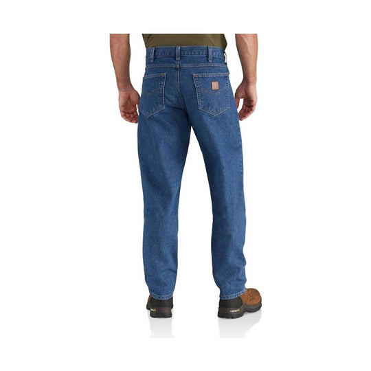 Back view of blue straight-leg jeans with back pockets and tan work boots