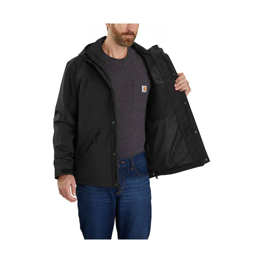 Black hooded rain jacket worn open over a dark shirt and jeans