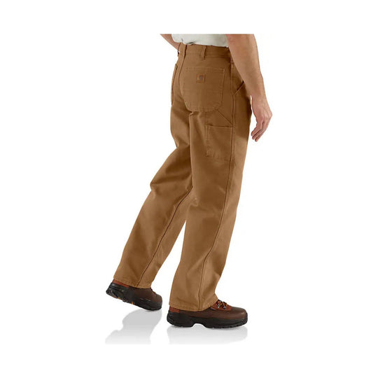 Brown work pants with large back pocket and side utility pocket, shown on a model from the side