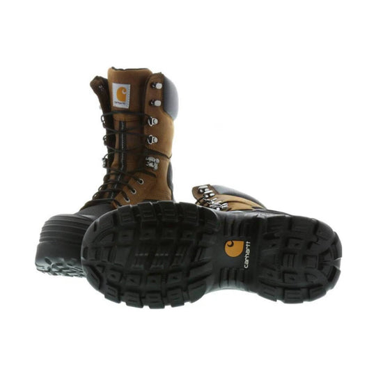 Brown and black insulated work boots with thick lug soles and visible Carhartt logo