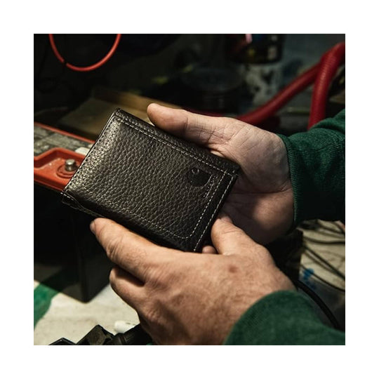 Black pebbled leather trifold wallet with visible stitching and a small embossed logo