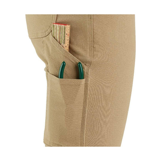 Tan canvas work pants pocket with a ruler and green-handled pliers tucked inside