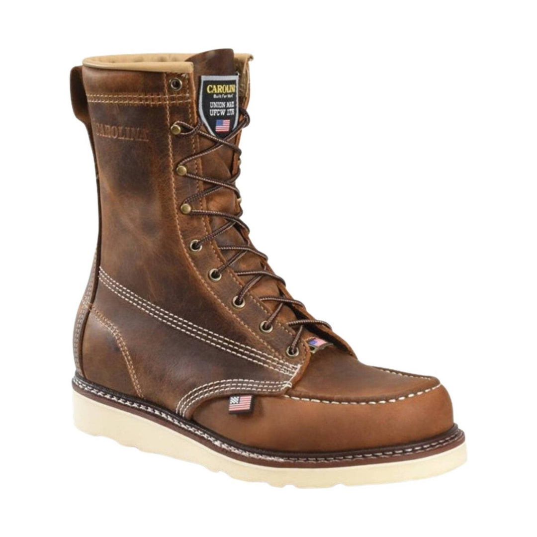 Brown leather lace-up work boot with a light wedge sole and visible side branding patch