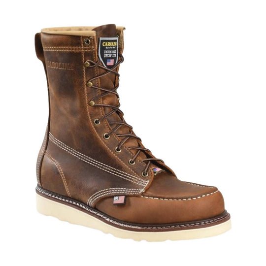 Brown leather lace-up work boot with a light wedge sole and visible side branding patch