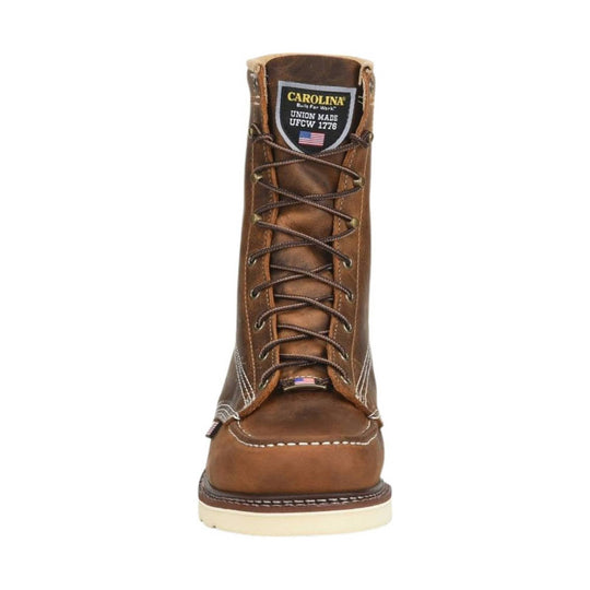 Brown leather pull-on work boot with lace-up front and wedge sole, shown from the front