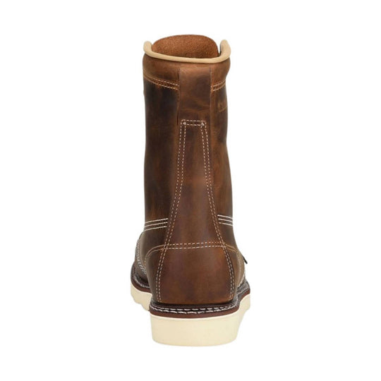 Brown leather pull-on work boot with cream sole, rear view
