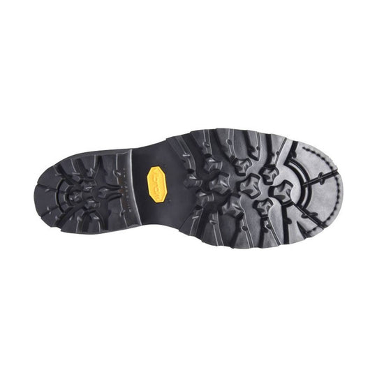 Black lugged boot sole with a yellow Vibram badge.
