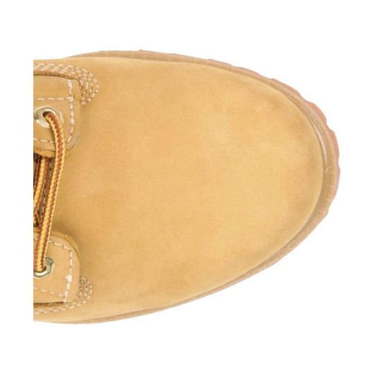 Tan leather work boot toe with white stitching and yellow-brown laces