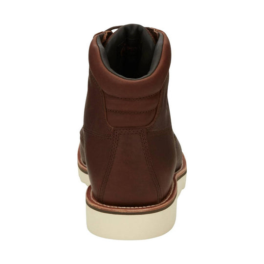 Rear view of a brown leather ankle boot with padded collar and cream rubber sole