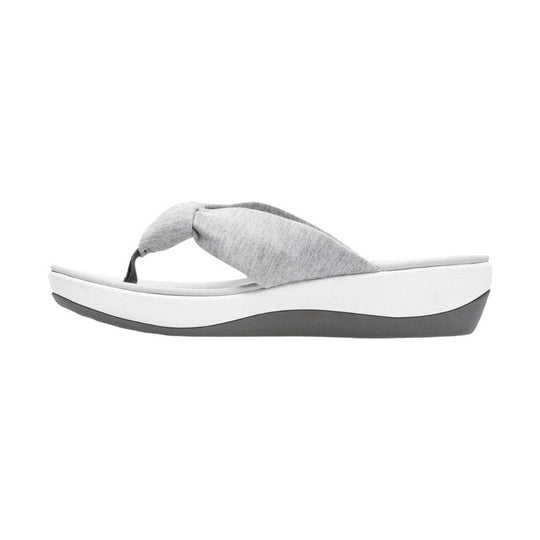 Gray fabric thong sandal with a white platform wedge sole