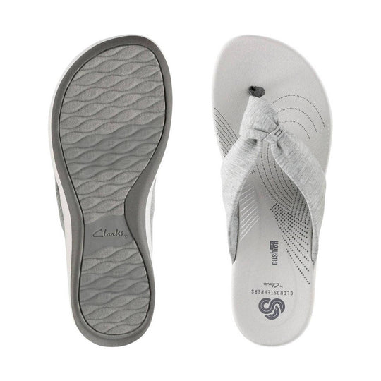 Gray thong sandal shown from top and sole, with Clarks and Cushion Soft branding