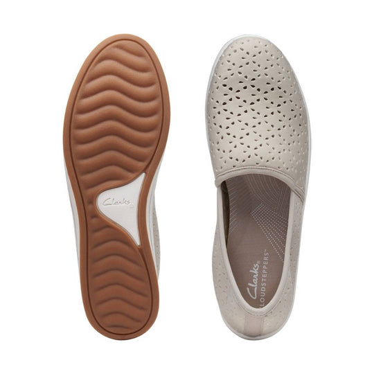 Light taupe perforated slip-on flats with tan rubber soles, shown top and sole views