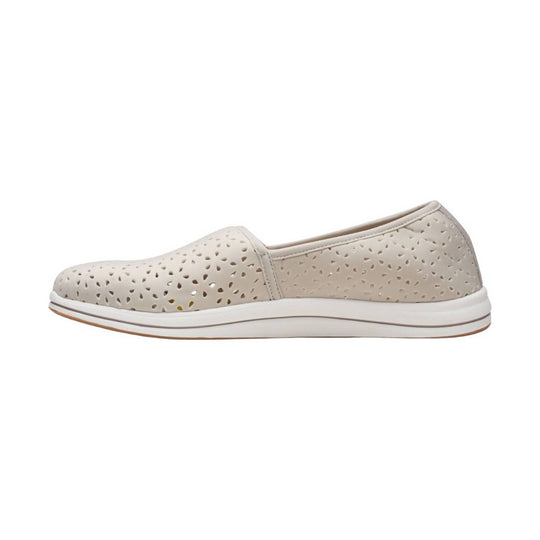 Light taupe perforated slip-on flat with a white sole
