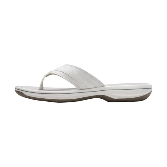 White thong sandal with a cushioned sole and woven strap detail