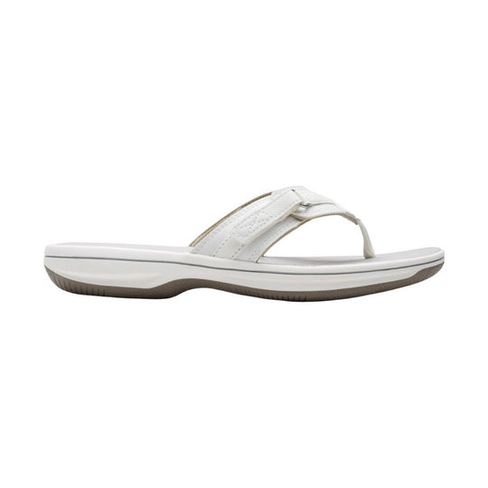 White thong sandal with a cushioned sole and crossed straps