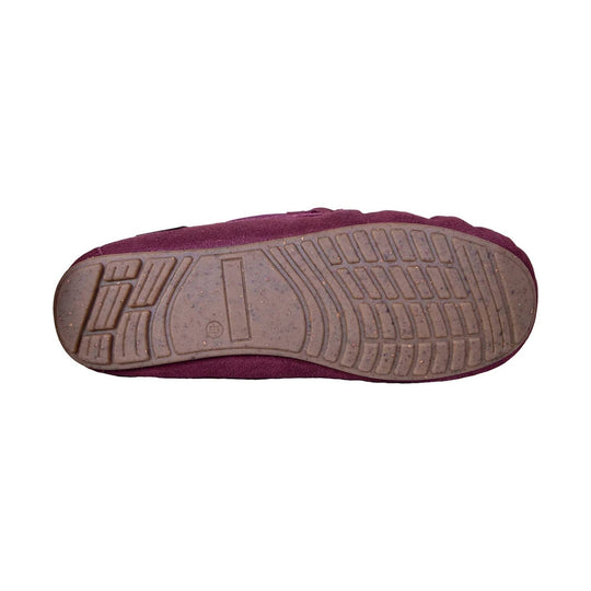 Underside of a burgundy moccasin slipper with a textured rubber sole
