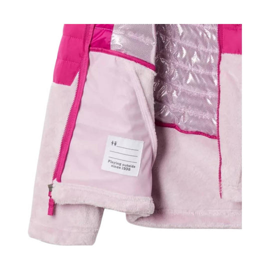 Pink and pale pink puffer jacket close-up with fleece trim and a tag reading "Playing outside since 1938"