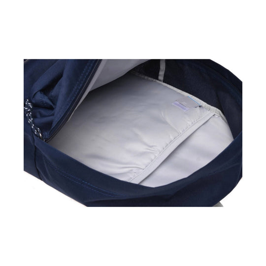 Open navy backpack showing a light gray padded laptop sleeve inside