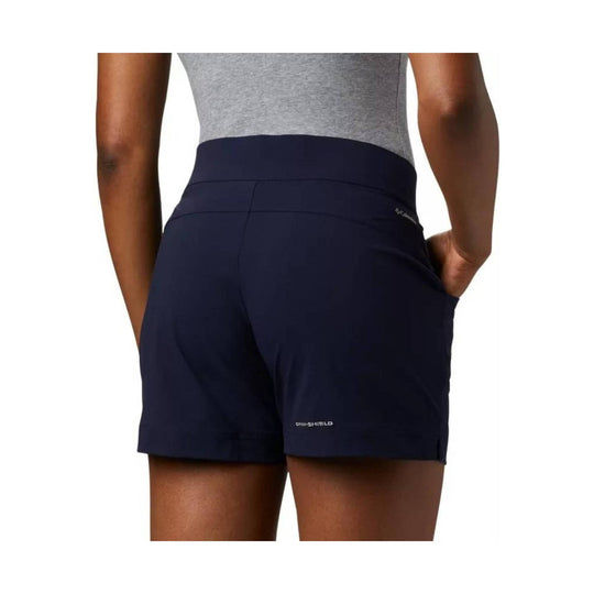 Dark navy women’s athletic shorts with a high waistband, back view