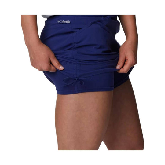 Navy athletic skort with built-in shorts and side tie detail