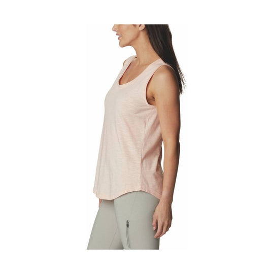 Light pink sleeveless scoop-neck tank top worn with gray leggings, side view
