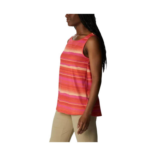 Sleeveless striped tank top in pink, coral, and orange, shown on a model in side view