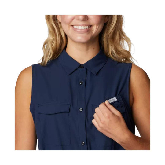 Navy sleeveless button-up collared shirt with flap chest pockets and a Columbia tag