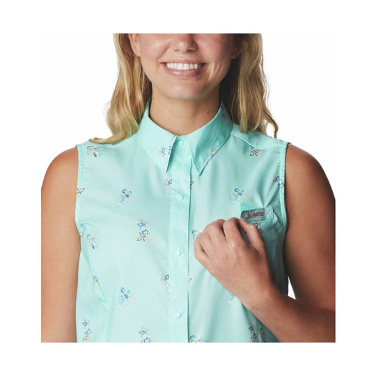 Sleeveless mint green button-up shirt with small floral print and Columbia chest label