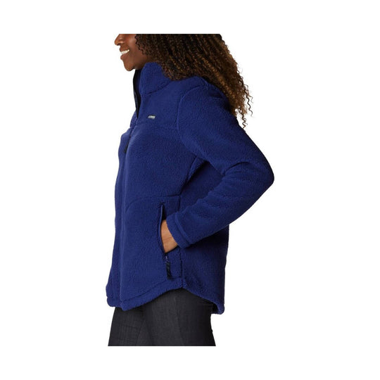 Blue fleece zip-up jacket with high collar and side hand pockets, shown in side profile