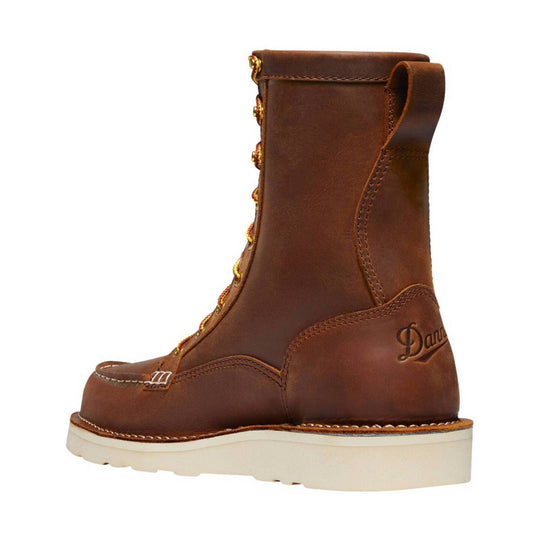 Brown leather work boot with moc toe, white sole, and side lacing