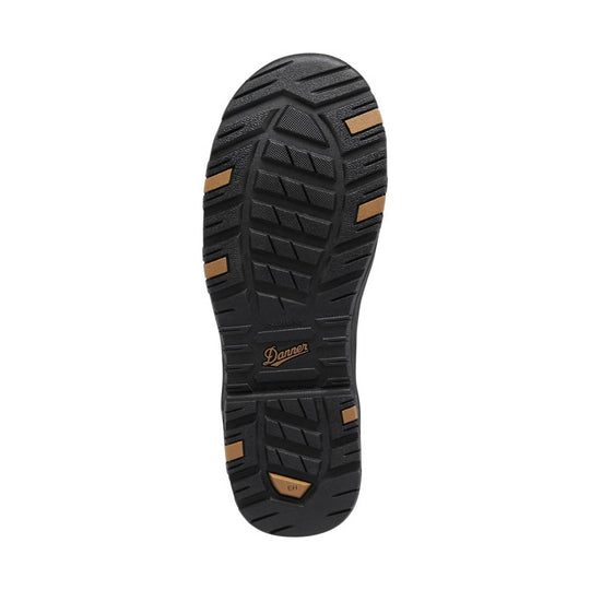 Black work boot outsole with tan traction inserts and Danner branding