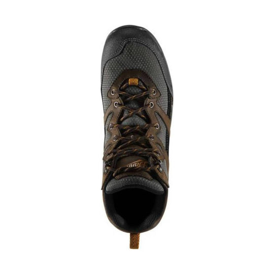 Brown and black work boot viewed from above with metal eyelets and crisscross laces