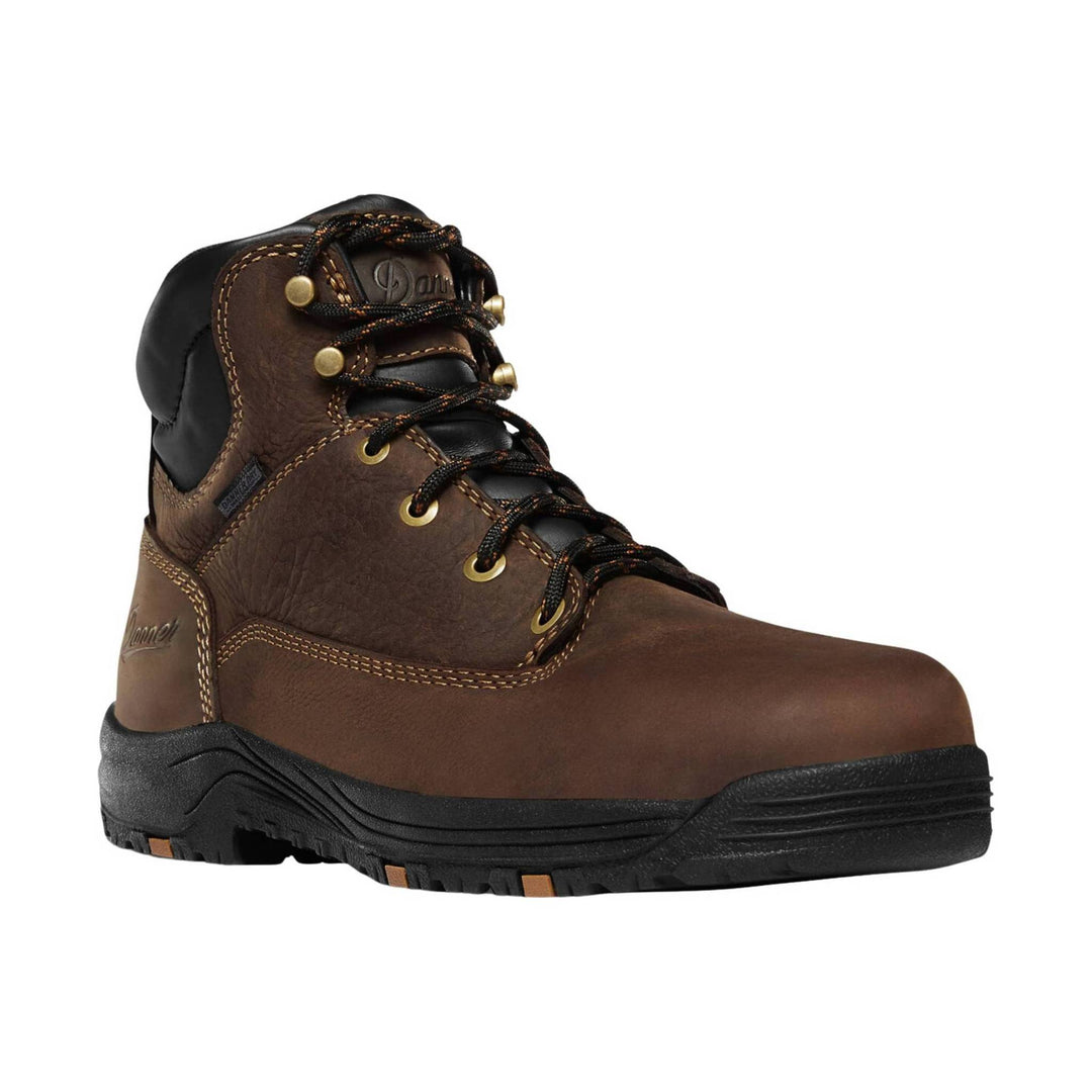 Brown leather work boot with black padded collar, gold eyelets, and black lug sole