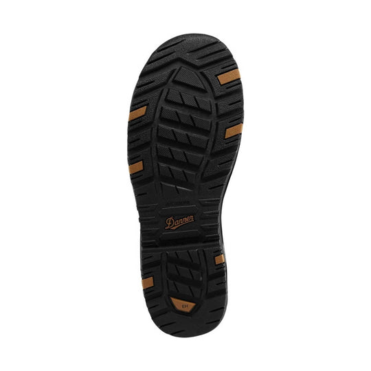 Black boot outsole with deep tread and tan traction inserts, labeled Danner and EH