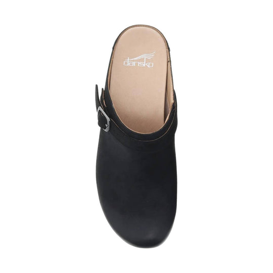 Black leather clog mule with an open back, side buckle, and tan footbed