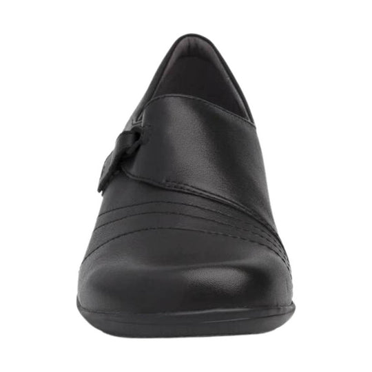 Black pointed-toe slip-on shoe with a wide front strap and low heel