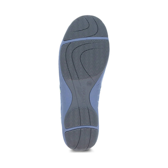 Blue flat shoe sole with wavy tread pattern and embossed branding