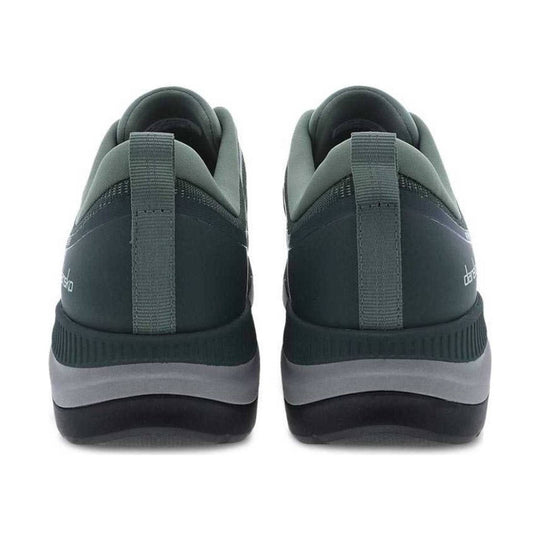 Pair of dark green and black slip-on sneakers shown from the back