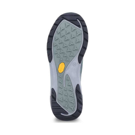 Shoe outsole with gray traction panels, black rubber edges, and a yellow stability insert