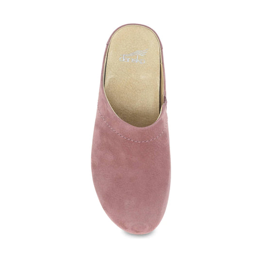 Pink suede clog with a closed toe and tan insole.