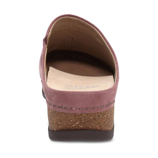 Pink suede clog seen from the back with a cork wedge heel and dark sole
