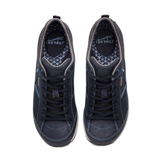 Pair of navy low-top sneakers with black laces and contrast stitching, shown from above