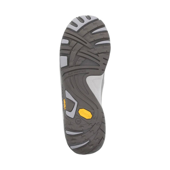 Gray shoe outsole with slip-resistant tread and yellow accent inserts
