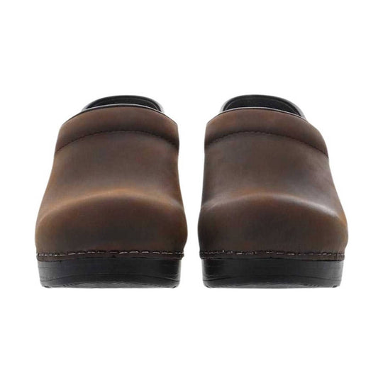 Pair of brown leather clogs with black soles, shown from the back