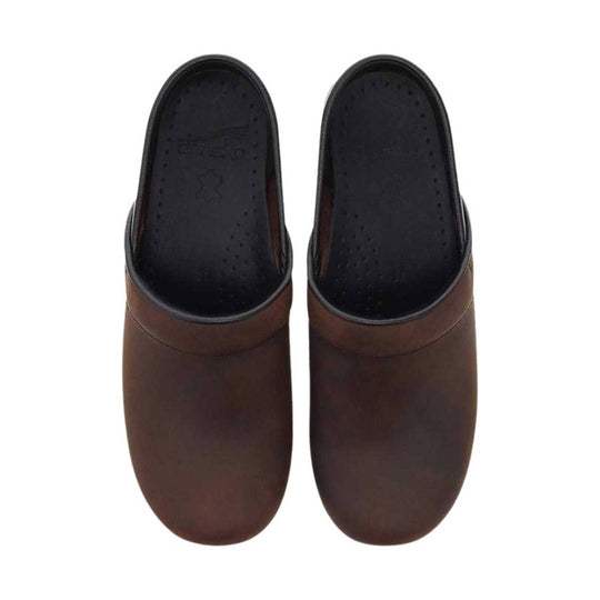 Pair of brown leather clogs with black insoles, shown from above