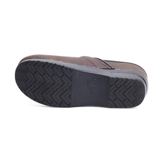 Brown closed-back clog shown from the sole side with a black treaded outsole