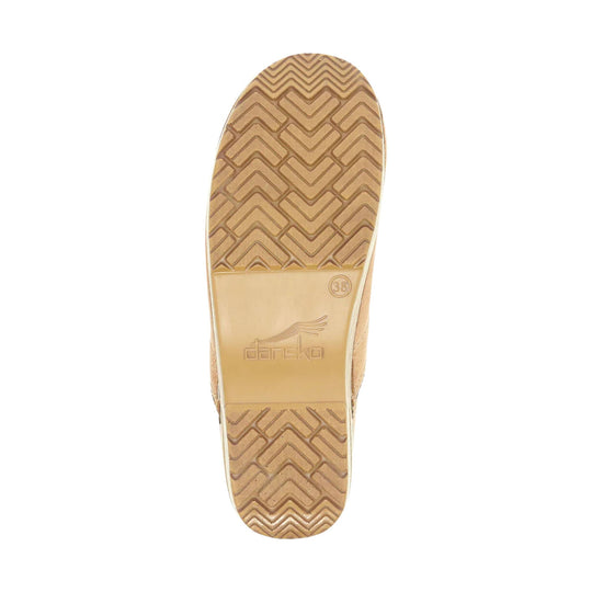 Tan shoe sole with herringbone tread and Dansko logo embossing