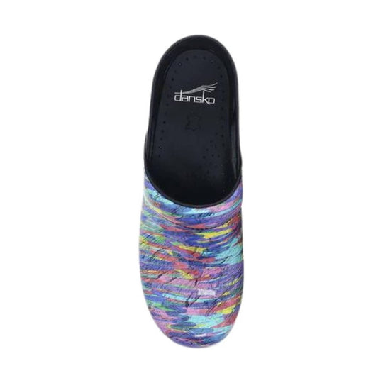 Black clog with multicolor abstract printed upper and visible Dansko logo inside