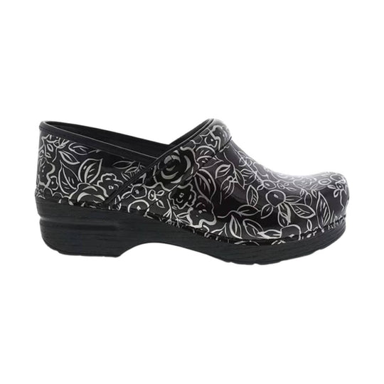 Black clogs with white floral pattern and a chunky wooden-style sole
